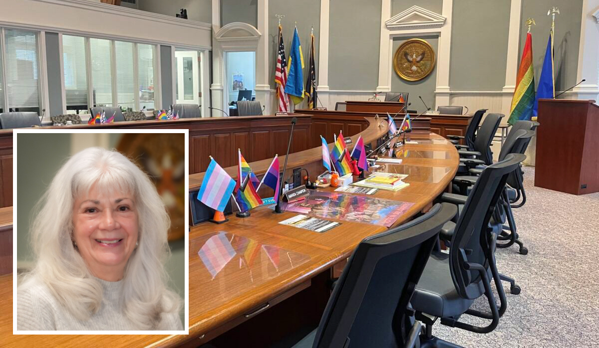 Image of Deborah Dawson superimposed on picture of Tompkins County Legislative Chambers.